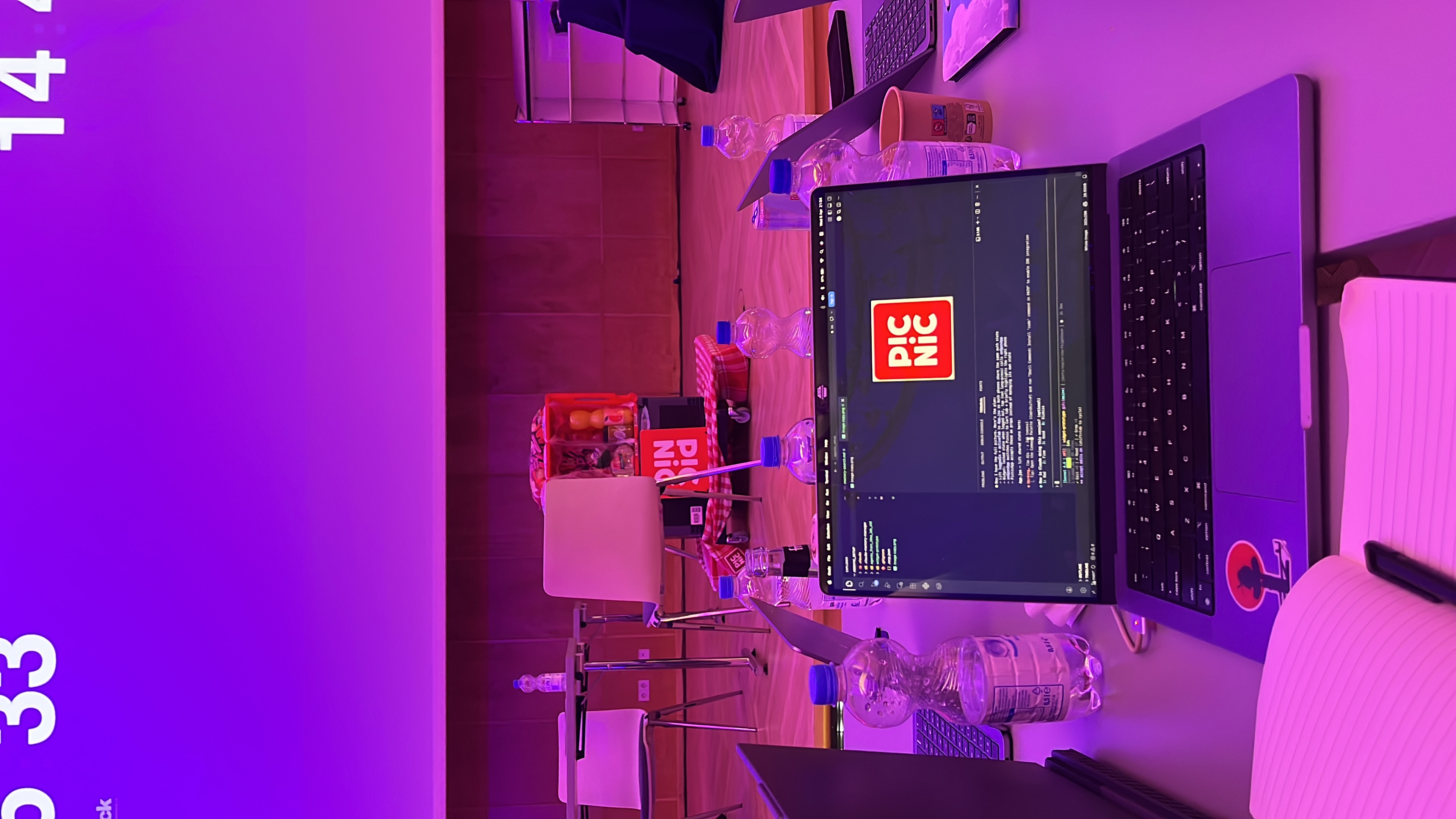 Q-Hack coding table with laptop and Picnic demo